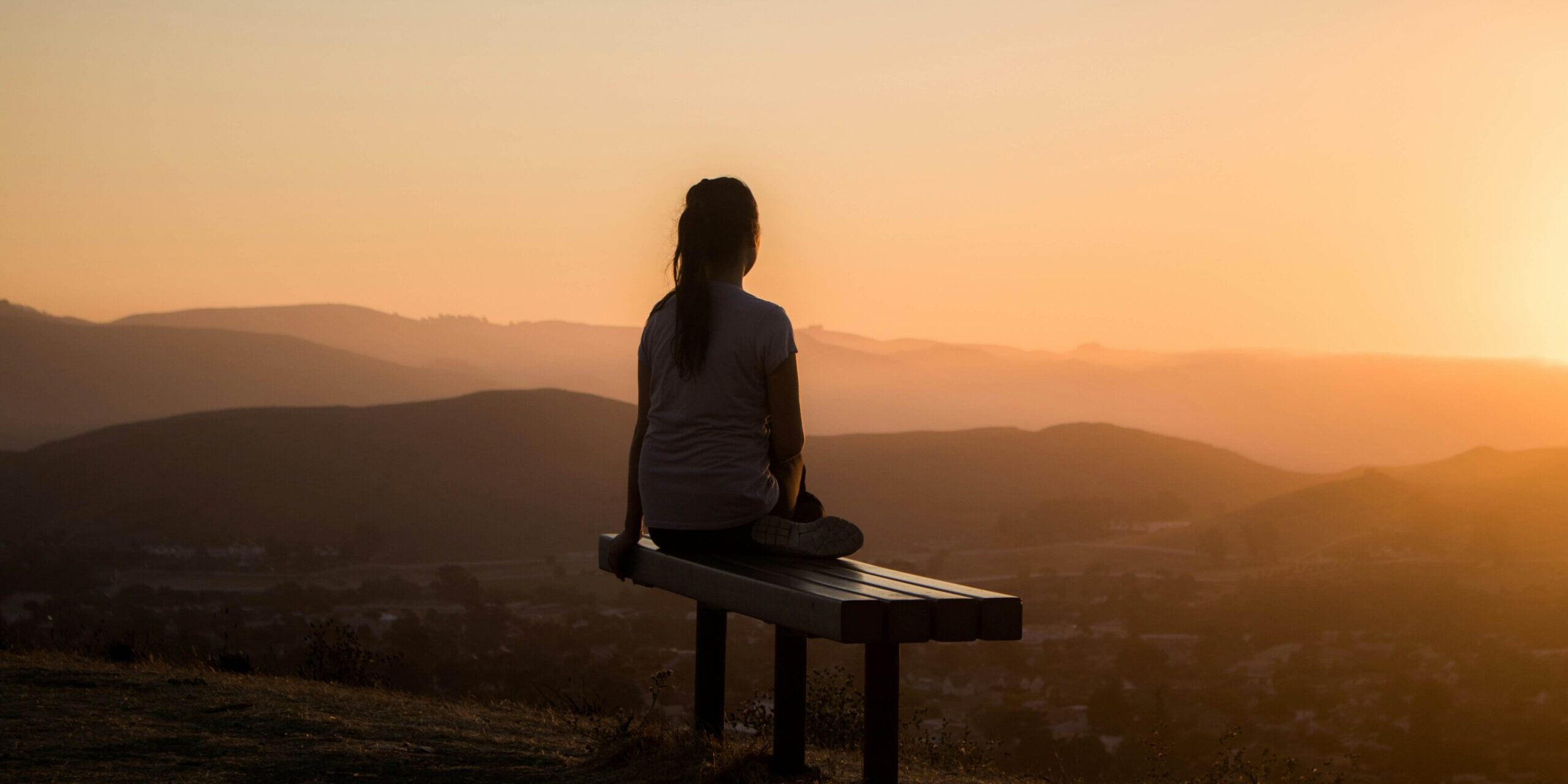 Person practicing mindfulness in a calm setting — intrusive thoughts OCD anxiety Denver CO