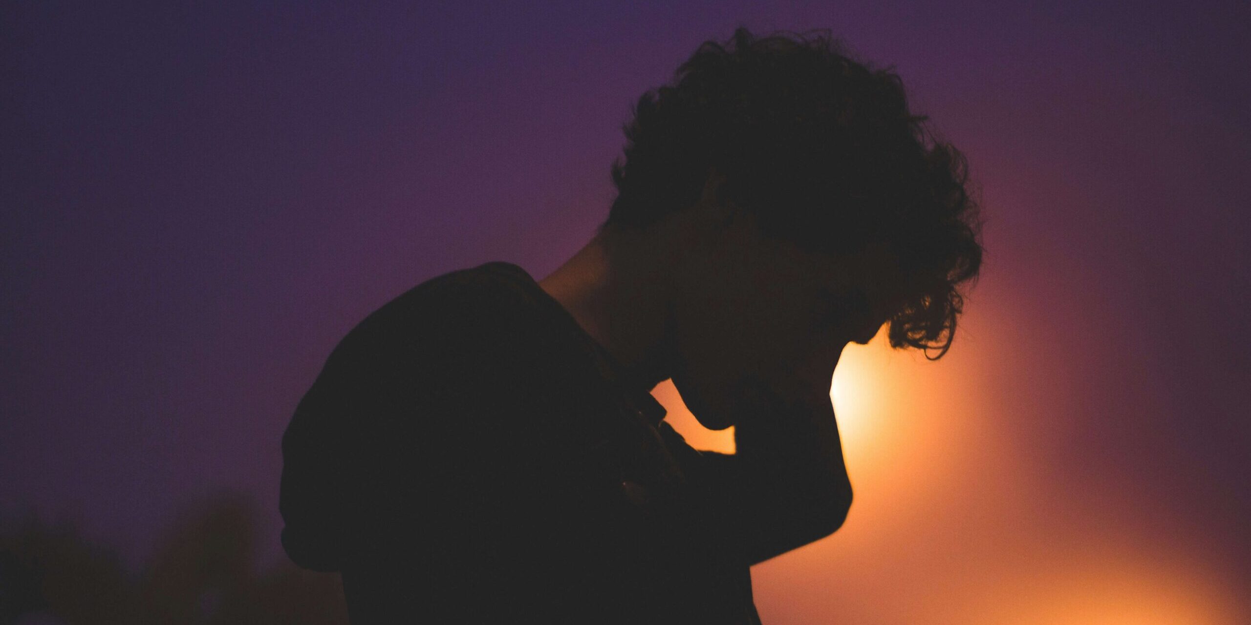 Person sitting quietly in thought — Pure O OCD intrusive thoughts treatment Englewood CO