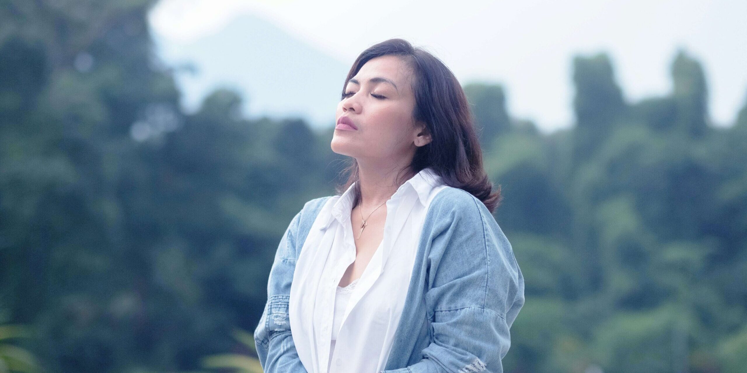 Person practicing calm breathing — panic attacks vs anxiety attacks explained