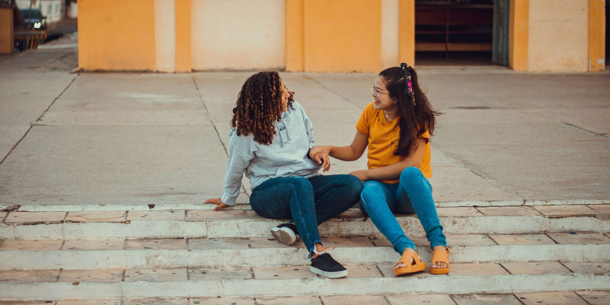 Teenager talking with supportive parent — teen anxiety signs parents miss Denver CO